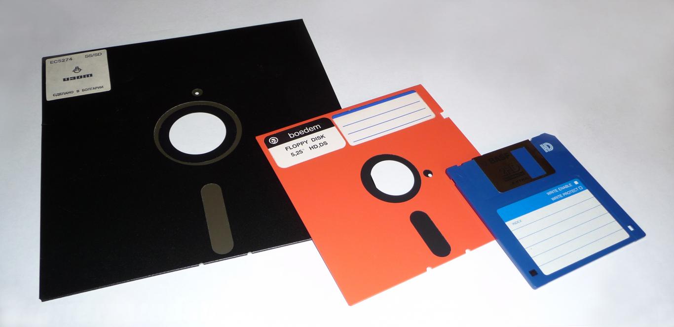 An image of an 8", 5.25", and a 3.5" floppy sitting next to each other