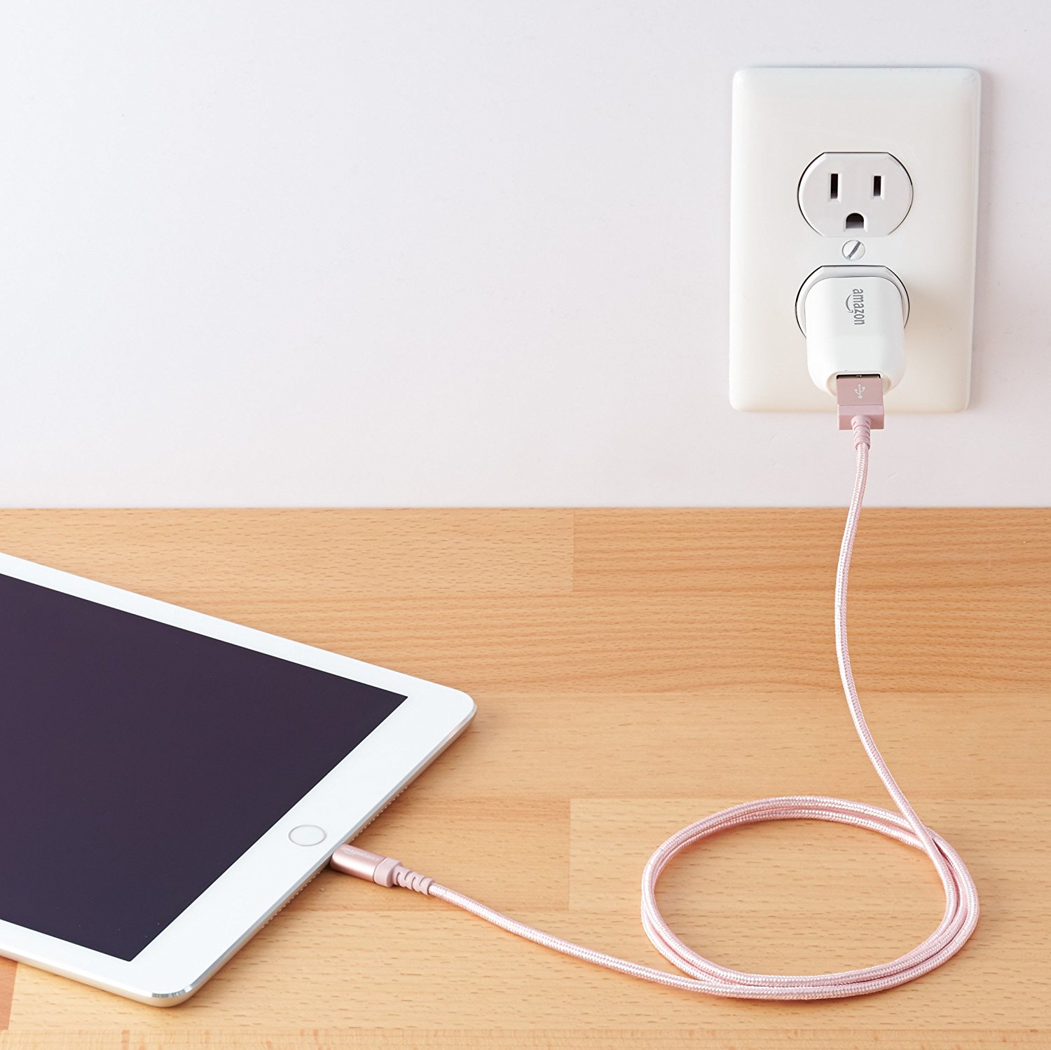 The AmazonBasics Braided Nylon USB A to Lightning Cable, shown in the color Rose Gold.